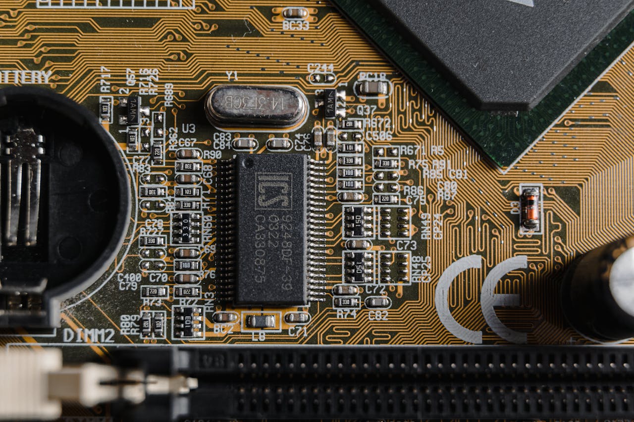 Services-02 Detailed view of circuit components on a printed circuit board (PCB).